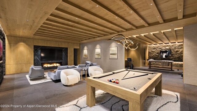 playroom featuring beamed ceiling, wooden ceiling, and pool table