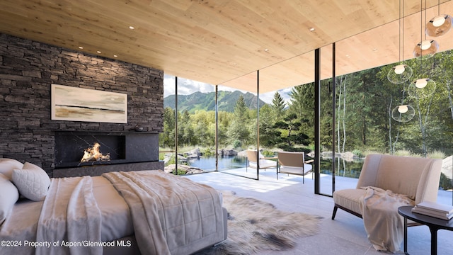 bedroom with a fireplace, a water and mountain view, and wood ceiling