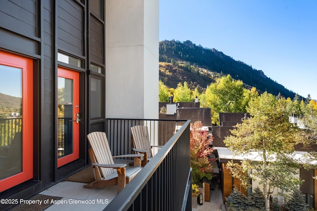 balcony featuring a mountain view