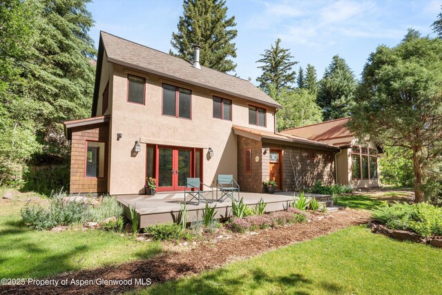 135 Irwin Dr, Redstone, CO 81623 - back of house featuring stucco siding, a yard, french doors, and a patio area