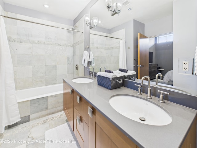 231 Robinson St Unit R306, Basalt, CO 81621 - bathroom with tiled shower / bath, ensuite bathroom, double vanity, and recessed lighting