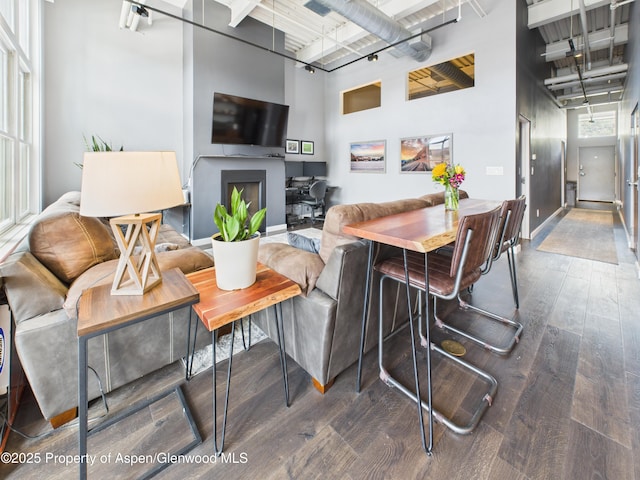 231 Robinson St Unit R306, Basalt, CO 81621 - living area featuring a towering ceiling and wood finished floors