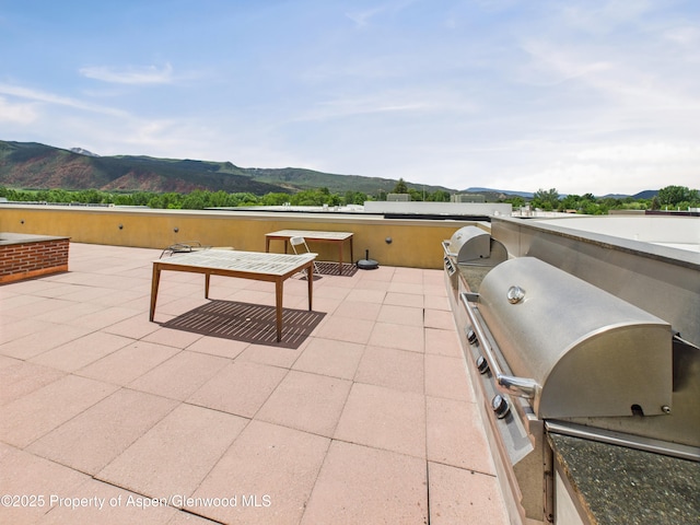 231 Robinson St Unit R306, Basalt, CO 81621 - view of patio / terrace with a grill and a mountain view