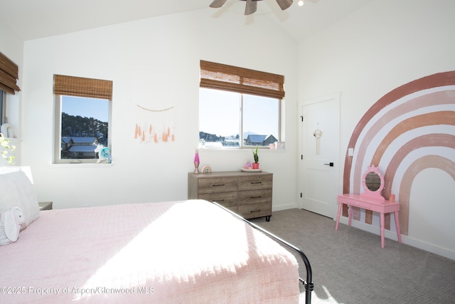 carpeted bedroom with lofted ceiling and ceiling fan