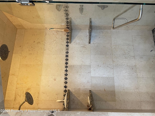 bathroom view of tiled shower