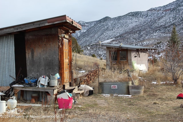 view of home's exterior featuring a mountain view