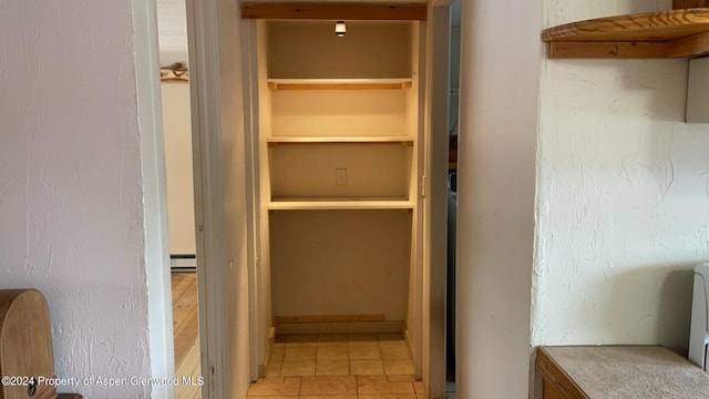 closet with baseboard heating