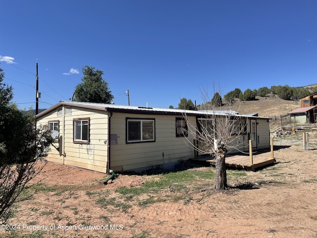 exterior space featuring a deck