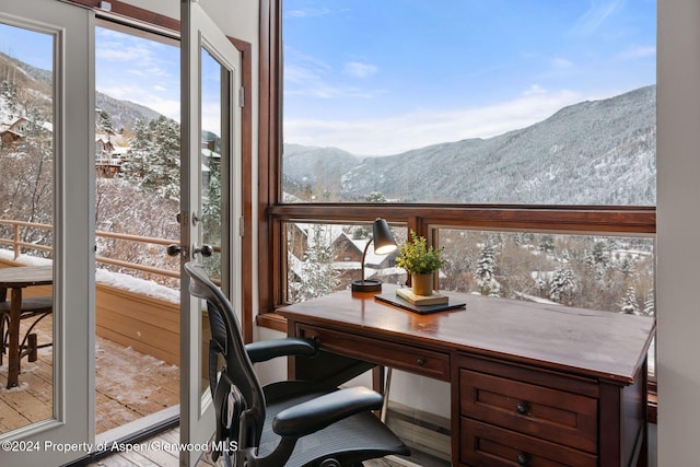 interior space featuring a mountain view and french doors