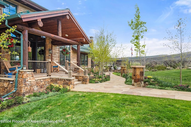 view of yard featuring a porch