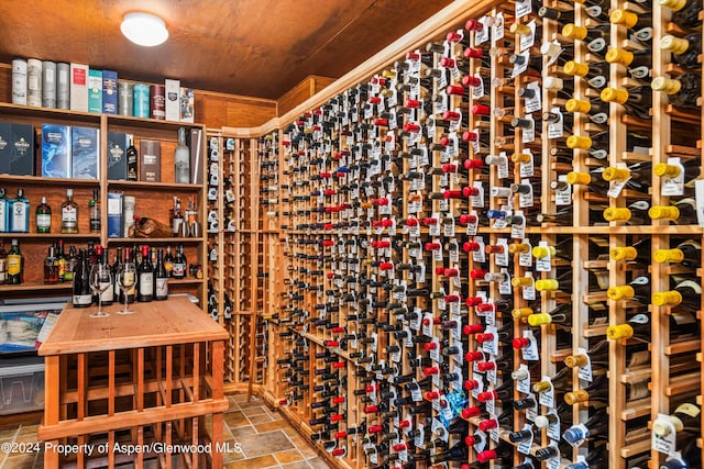 wine area with wooden ceiling