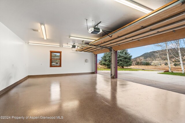 199 Bluestem Ct, Carbondale, CO 81623 - garage with a mountain view and a garage door opener