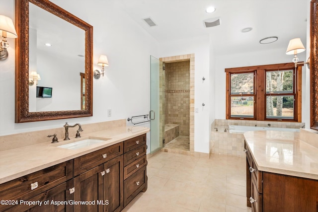 199 Bluestem Ct, Carbondale, CO 81623 - bathroom featuring tile patterned flooring, vanity, and walk in shower