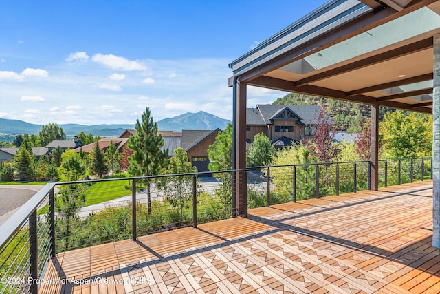 view of patio / terrace featuring a mountain view and a balcony