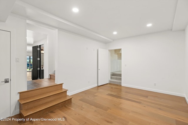 unfurnished room with light hardwood / wood-style flooring