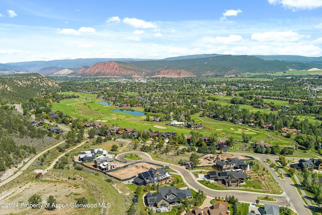 aerial view with a water and mountain view