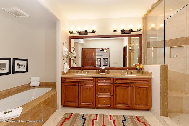 bathroom featuring vanity, tile patterned floors, shower with separate bathtub, and ceiling fan