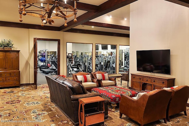 living room with beam ceiling and a chandelier