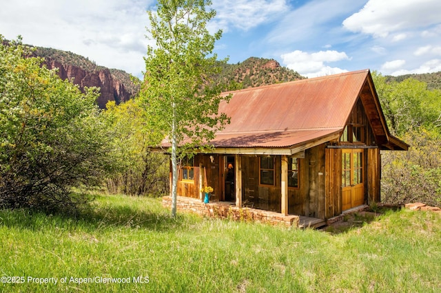 5548 Frying Pan Rd, Basalt, CO 81621 - back of property featuring a metal roof and a mountain view