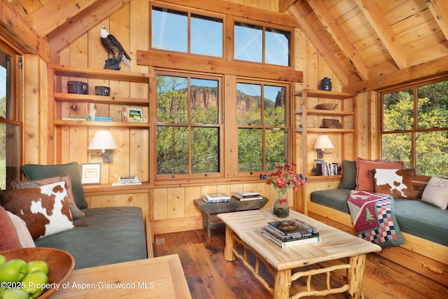 5548 Frying Pan Rd, Basalt, CO 81621 - living area featuring wood-type flooring, wood walls, high vaulted ceiling, and a wooden ceiling with exposed beams