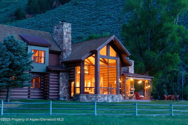5548 Frying Pan Rd, Basalt, CO 81621 - rear view of property featuring a chimney