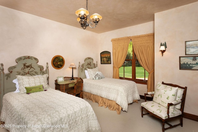 5548 Frying Pan Rd, Basalt, CO 81621 - bedroom featuring a chandelier and carpet floors