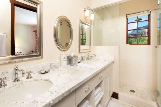 5548 Frying Pan Rd, Basalt, CO 81621 - bathroom with double vanity, a tile shower, and tile patterned flooring