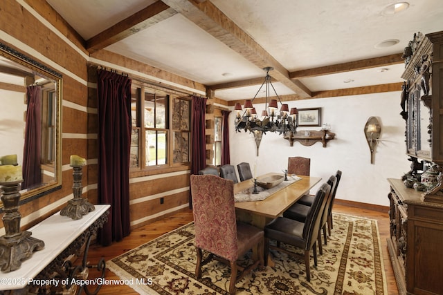 5548 Frying Pan Rd, Basalt, CO 81621 - dining room with a chandelier, wood finished floors, and beam ceiling