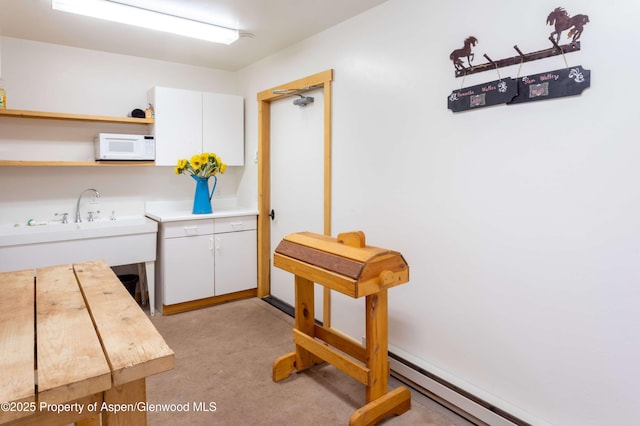 5548 Frying Pan Rd, Basalt, CO 81621 - kitchen featuring white microwave, white cabinets, light countertops, and open shelves