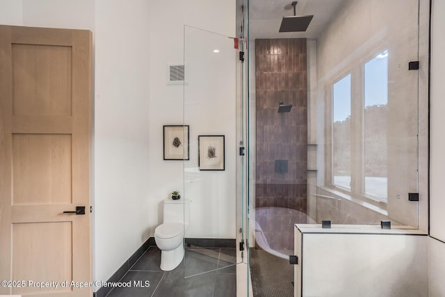 112 Bowles Dr, Carbondale, CO 81623 - full bathroom with a tub to relax in, tile patterned flooring, toilet, and a tile shower
