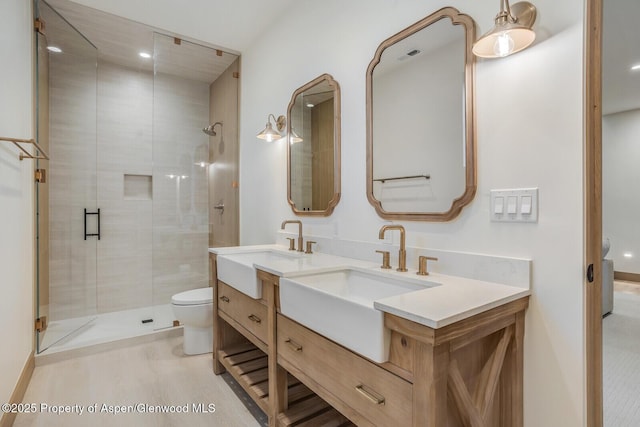 112 Bowles Dr, Carbondale, CO 81623 - full bath with double vanity, toilet, and a stall shower