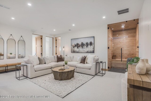 112 Bowles Dr, Carbondale, CO 81623 - carpeted living area with recessed lighting, wood walls, and baseboards