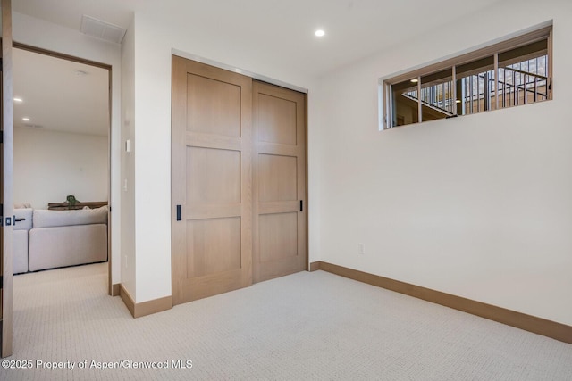 112 Bowles Dr, Carbondale, CO 81623 - unfurnished bedroom featuring carpet, baseboards, recessed lighting, and a closet