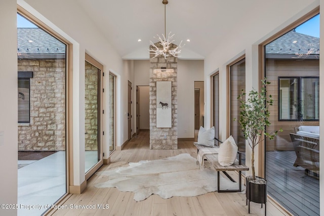 112 Bowles Dr, Carbondale, CO 81623 - foyer featuring wood-type flooring, a chandelier, plenty of natural light, recessed lighting, and baseboards