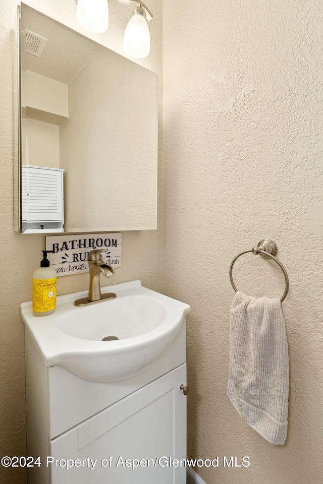 bathroom featuring vanity