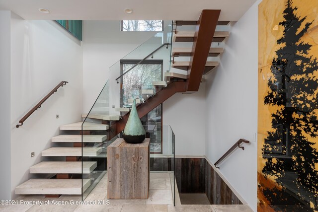 71 Smuggler Grv, Aspen, CO 81611 - staircase featuring tile patterned flooring
