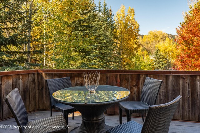 71 Smuggler Grv, Aspen, CO 81611 - wooden deck with outdoor dining space