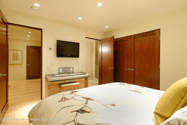 71 Smuggler Grv, Aspen, CO 81611 - bedroom featuring recessed lighting, light wood-style floors, and a closet