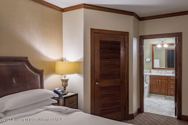 bedroom featuring carpet flooring, ornamental molding, connected bathroom, and a closet