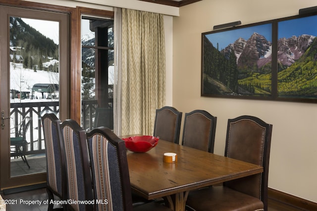 0197 Prospector Rd Unit 2412Summer Interest, Aspen, CO 81611 - dining room featuring wood finished floors and baseboards
