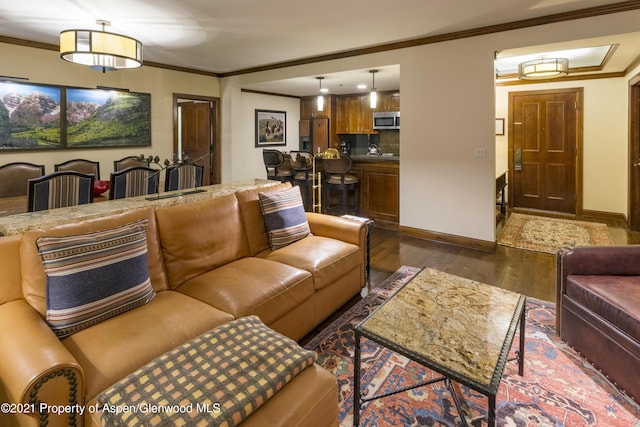 0197 Prospector Rd Unit 2412Summer Interest, Aspen, CO 81611 - living area with dark wood finished floors and crown molding