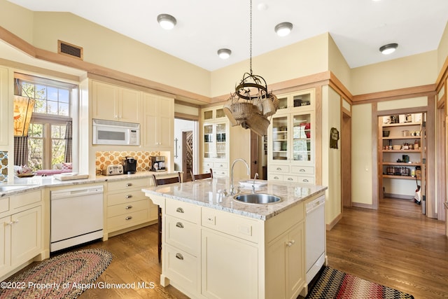 800 Chateau Way, Snowmass, CO 81654 - kitchen featuring hardwood / wood-style floors, white appliances, a kitchen island with sink, hanging light fixtures, and sink