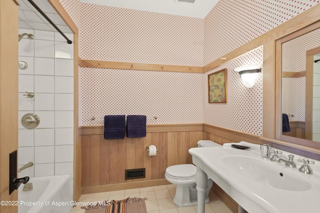 800 Chateau Way, Snowmass, CO 81654 - bathroom featuring tile patterned flooring, toilet, wood walls, and sink