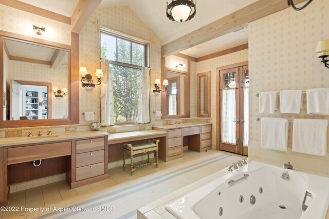 800 Chateau Way, Snowmass, CO 81654 - bathroom with tile patterned floors, vanity, and a relaxing tiled tub
