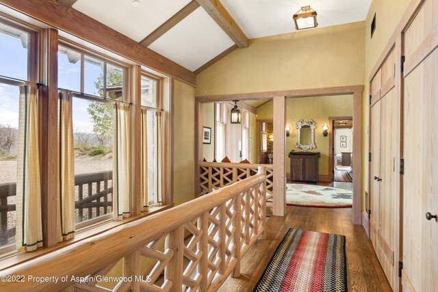 800 Chateau Way, Snowmass, CO 81654 - corridor with vaulted ceiling and dark hardwood / wood-style floors