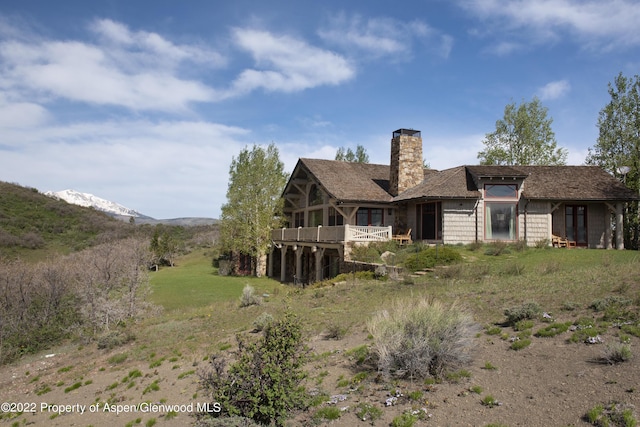 800 Chateau Way, Snowmass, CO 81654 - rear view of property featuring a mountain view