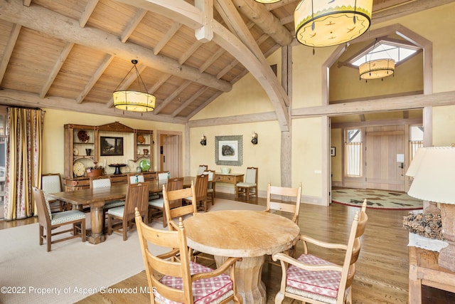 800 Chateau Way, Snowmass, CO 81654 - dining area with beamed ceiling, wood-type flooring, high vaulted ceiling, and wooden ceiling