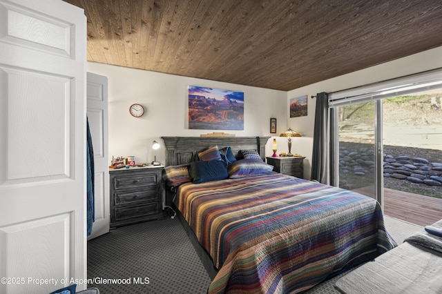 693 N 7th St, Silt, CO 81652 - bedroom featuring access to exterior, carpet flooring, and wood ceiling