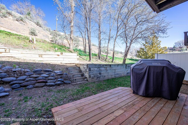 693 N 7th St, Silt, CO 81652 - wooden terrace featuring grilling area and fence