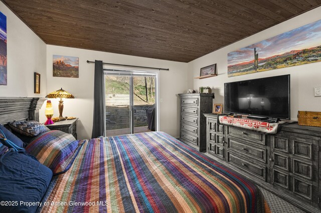 693 N 7th St, Silt, CO 81652 - bedroom with access to exterior and wooden ceiling